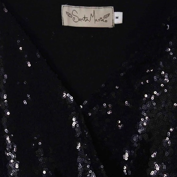 Santa Maria

Colombian brand
Sequin bodysuit in perfect condition - Picture 3 of 3